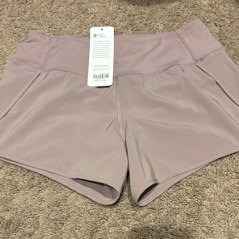 NWT CRZ yoga Women’s High-Waist Athletic Shorts - Dusty Mauve pastel purple